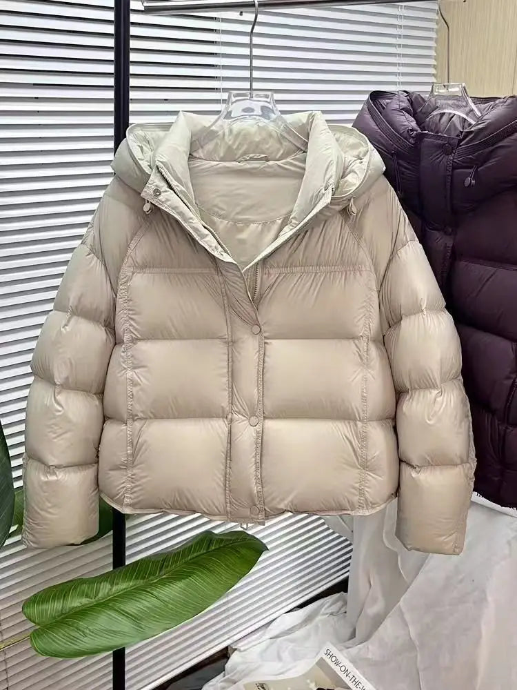 Beige puffer jacket loose hooded winter coat featuring a quilted design with a matching hood.