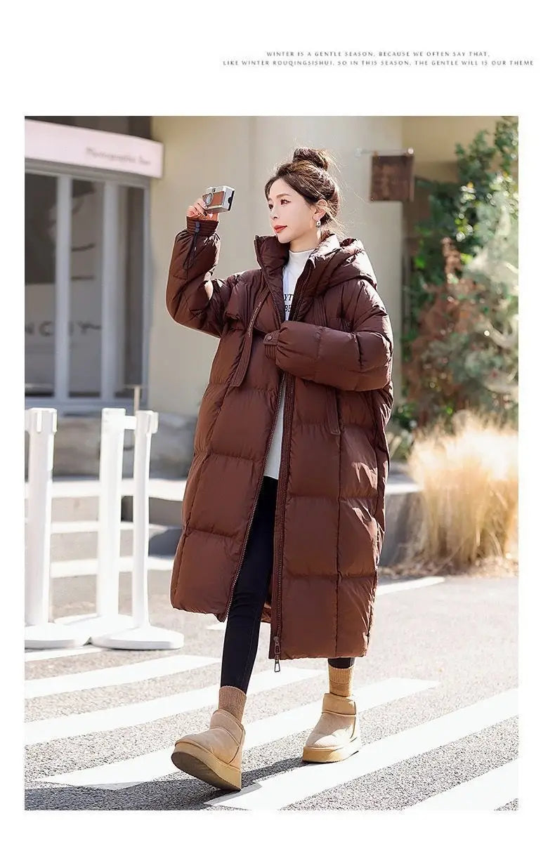 women long hooded puffer coat in brown featuring a quilted design and insulated material for cold weather use