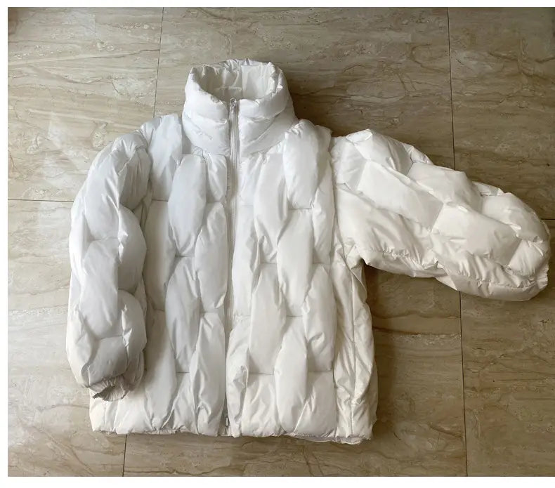 Plus size white quilted puffer jacket with high collar and zipper closure designed for warmth and comfort.
