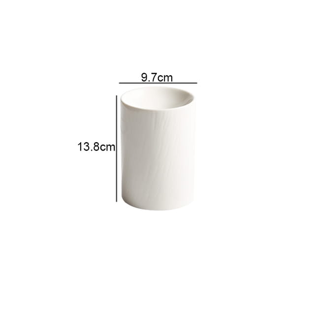 white ceramic cylindrical cup with matte textured finish measuring 9.7cm in diameter and 13.8cm in height from ceramic appetizer bowl set