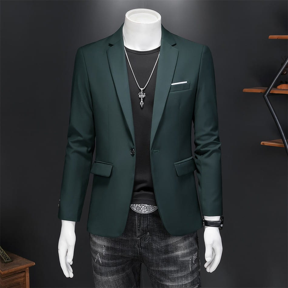 Chaqueta de vestir empresarial de pana verde oscuro con ajuste slim, solapas a pico tipo muesca y bolsillos con solapa.