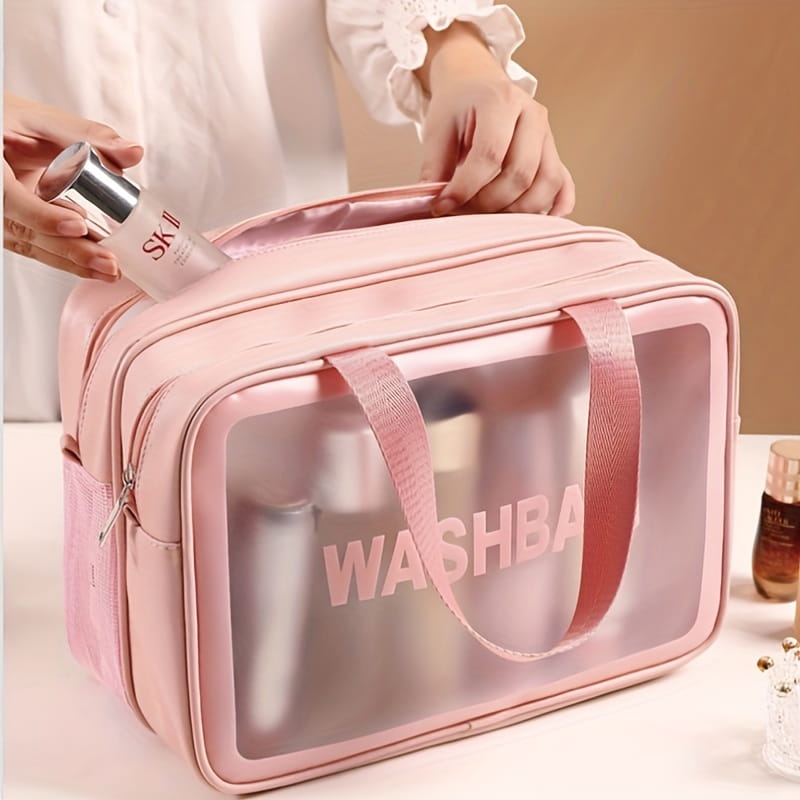 rosafarbene transparente Kulturbeutel-Reiseorganizer-Tasche mit bedrucktem washba in passender rosafarbener Schrift, gestaltet als Reisekosmetiktasche mit Funktion zur Trennung von trocken und nass; Wäsche-Organizer mit Reisefunktion