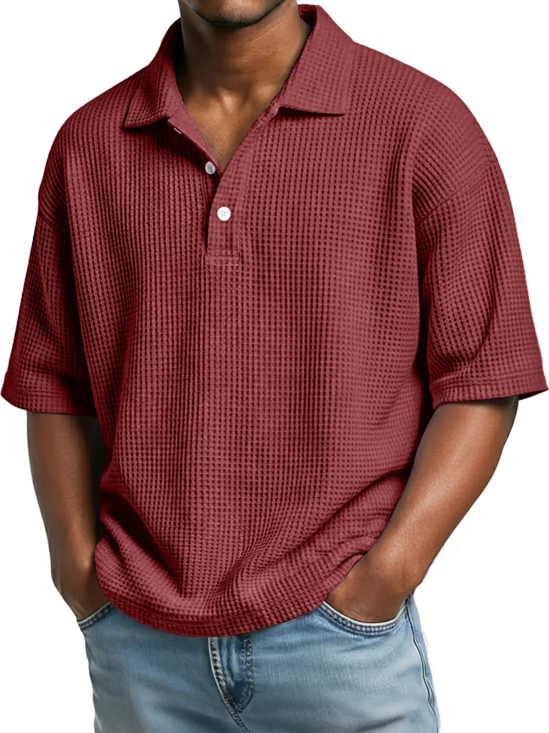 Men’s slim fit waffle knit short sleeve polo shirt in maroon featuring a collar and white buttons.