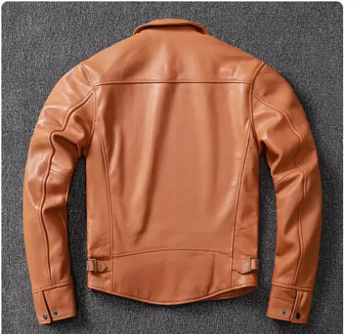 Men’s tan cowhide leather motorcycle jacket featuring classic stitching and snap-button cuffs.