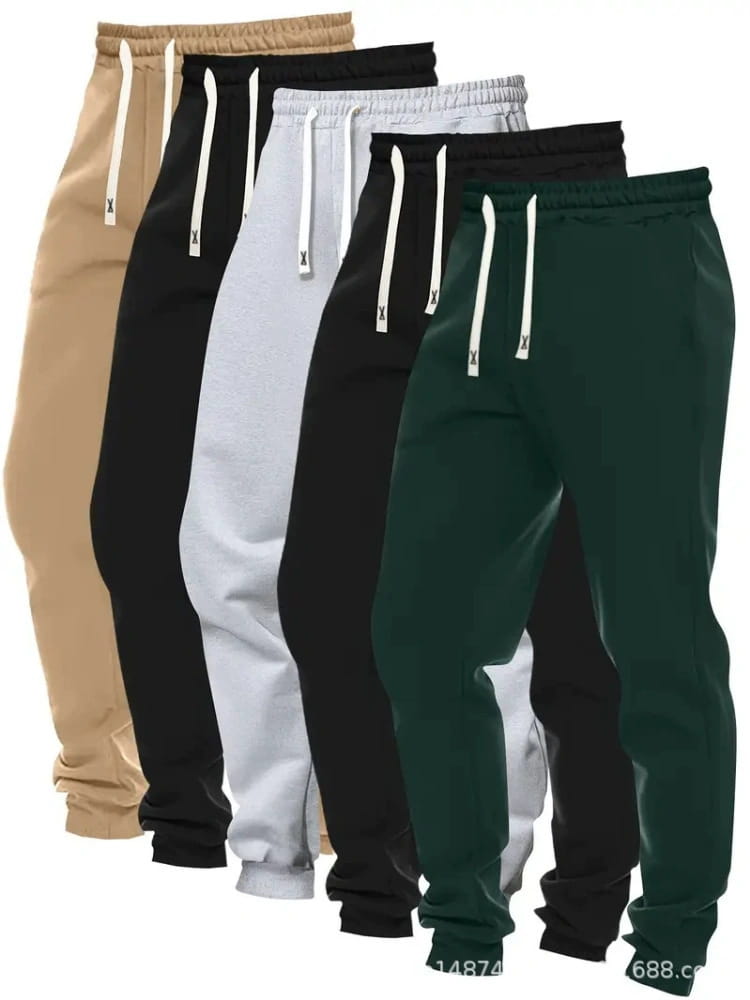 Men’s 5-pack solid jogger pants in beige black white dark green and gray with matching drawstrings made of comfortable casual fabric.
