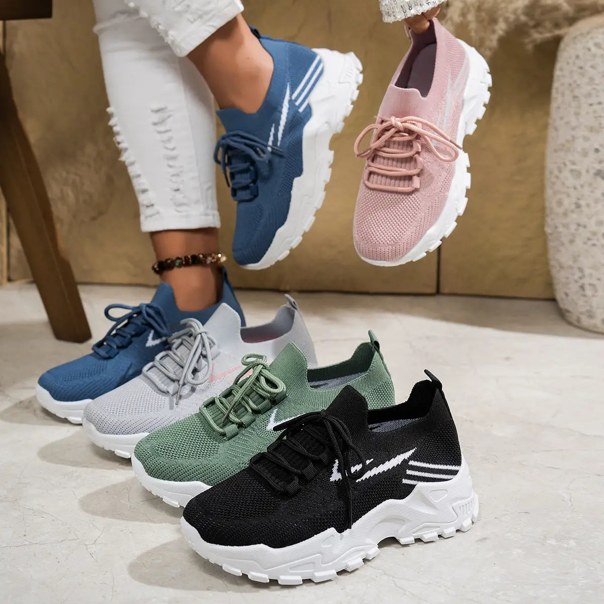women’s lightweight breathable mesh lace up sports shoes in gray knit with chunky white sole and pink accents