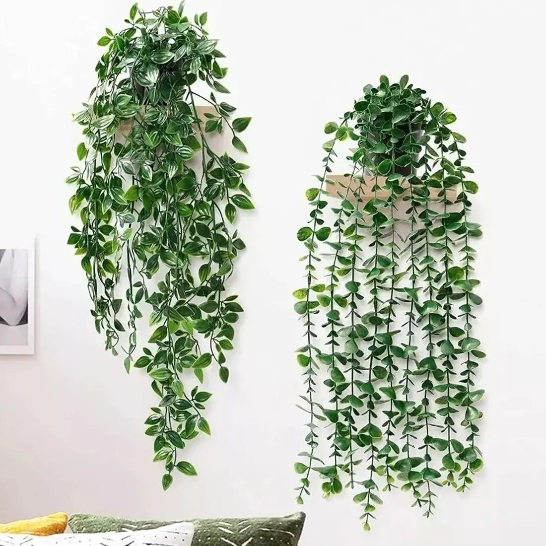 Artificial hanging plants 3 pack featuring green artificial hanging vines with realistic leaf patterns and slender stems designed for wall decor.