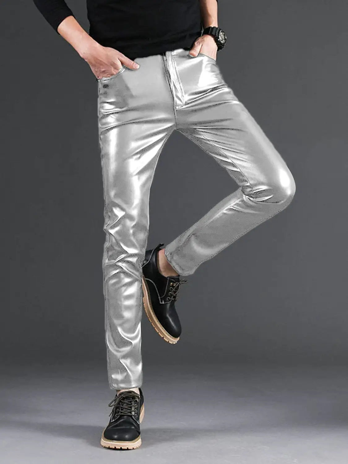 Men’s slim fit metallic and matte faux leather pants featuring shiny silver metallic skinny jeans.