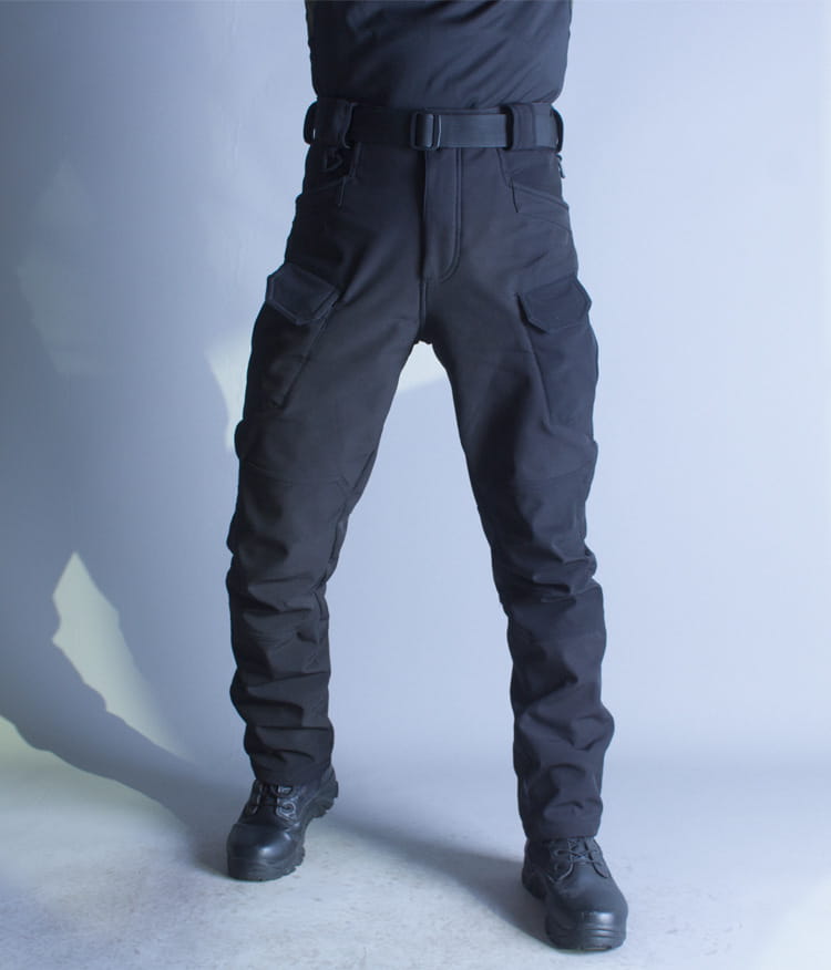Ix7 mens fleece lined tactical pants in black featuring multiple cargo pockets and a sturdy belt loop design for work and outdoor use.