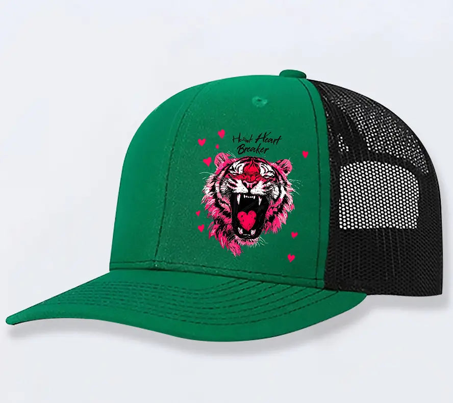 Green and black trucker hat with a vibrant pink tiger graphic and heart breaker text, designed for men in tan color.