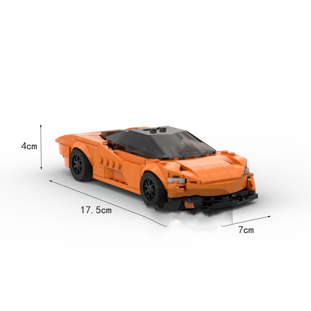 Juguete de coche deportivo Orange McLaren Speedtail construido con ladrillos de plástico interconectados, mostrado desde el lado trasero.