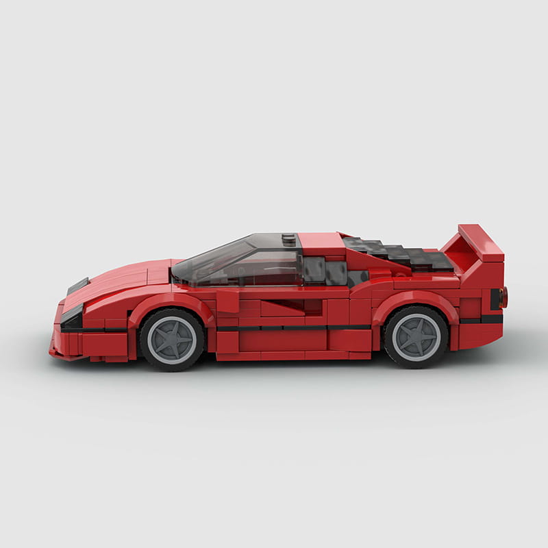 Modelo de coche deportivo de juguete de bloques tipo construcción, Ferrari F40 Lego rojo, con acentos negros y techo transparente.