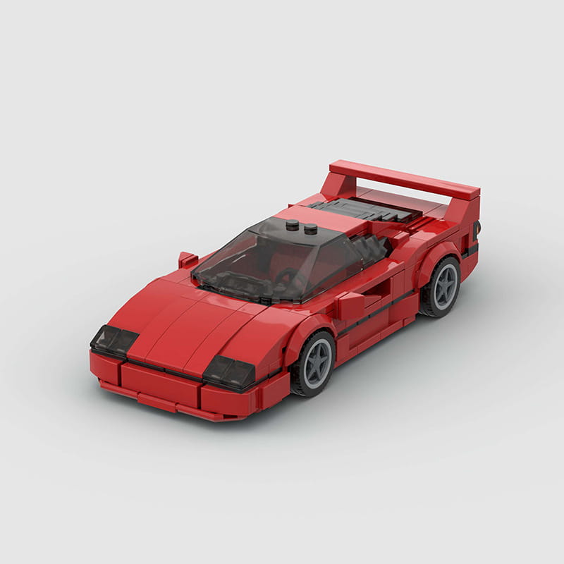 Modelo de coche deportivo de juguete de bloques tipo construcción, Ferrari F40 Lego rojo, con acentos negros y ruedas grises.