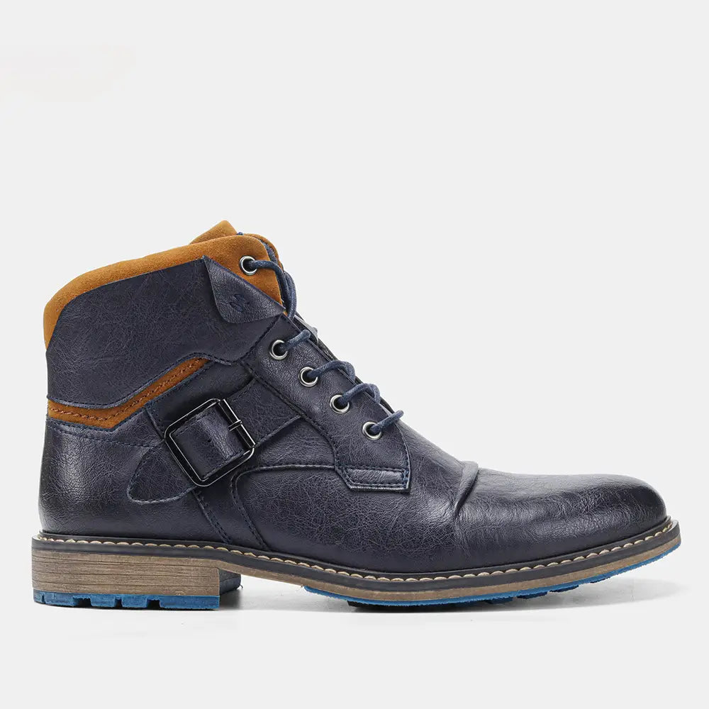 Men’s leather martin boot in dark blue with tan suede accents and a contrasting blue rubber sole.