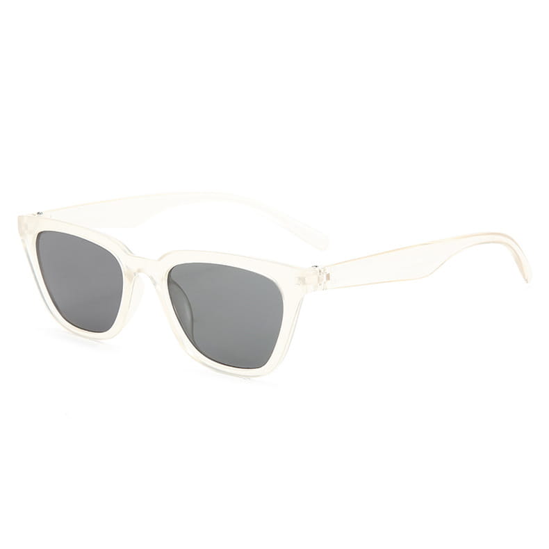 Vintage cat eye acetate sunglasses featuring clear frames and dark gray lenses.