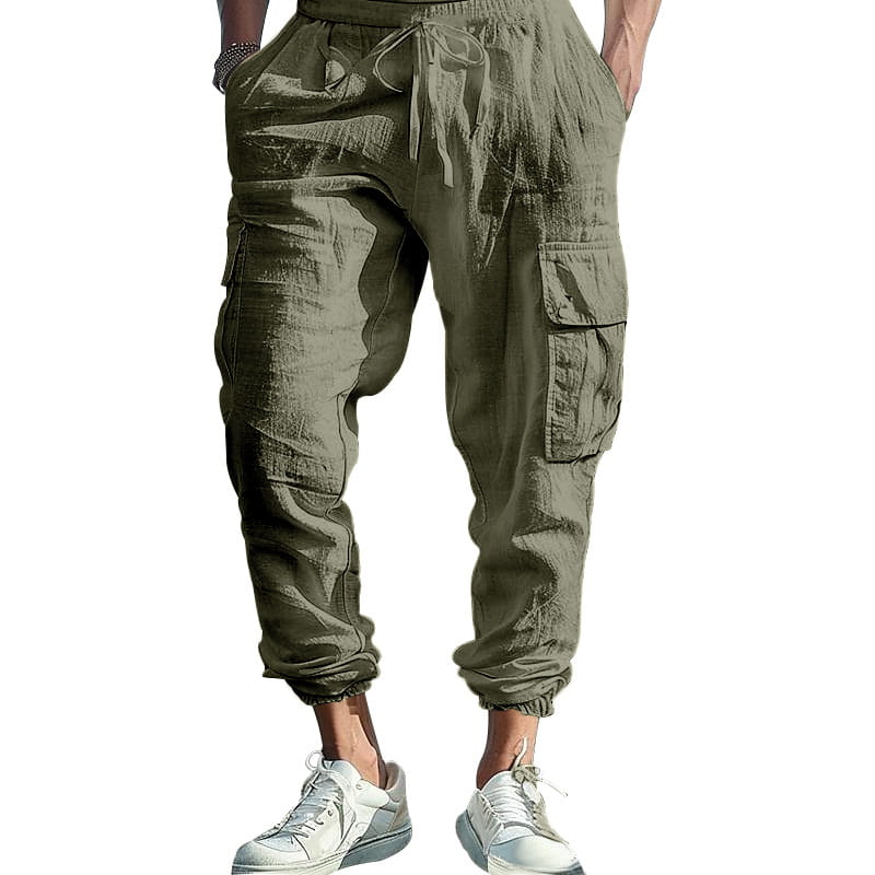 Men linen cargo pants in olive green featuring multiple pockets and elastic drawstring cuffed ankles.
