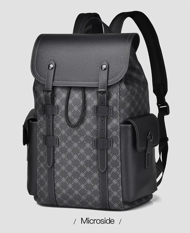 Men’s leather business travel backpack with a textured black leather-like flap, gray patterned fabric body, black adjustable straps, and a laptop sleeve.