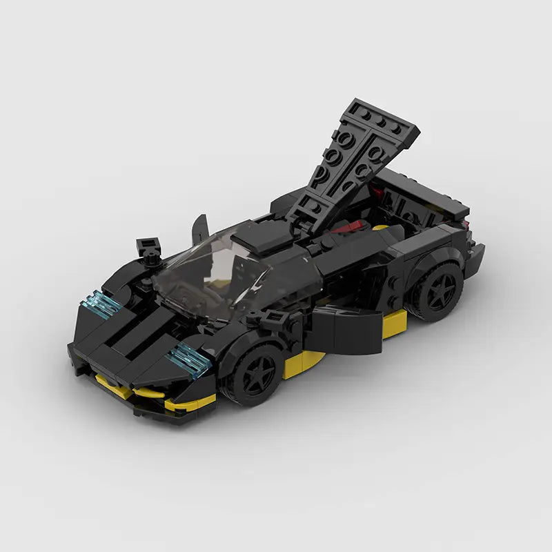 Voiture de sport Lego Technic noir et jaune avec cabine transparente, hayon arrière ouvert et roues détaillées, de l’ensemble de construction de la voiture de course M10271, 326 pièces illustrées depuis l’arrière.