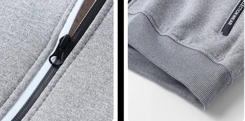Herren-Schwergewicht-Sherpa-Fleecepullover mit Reißverschluss, innen mit Sherpa gefüttert, aus grauem meliertem Material, mit schwarzem Reißverschluss, weißem Besatz und geripptem Bund.