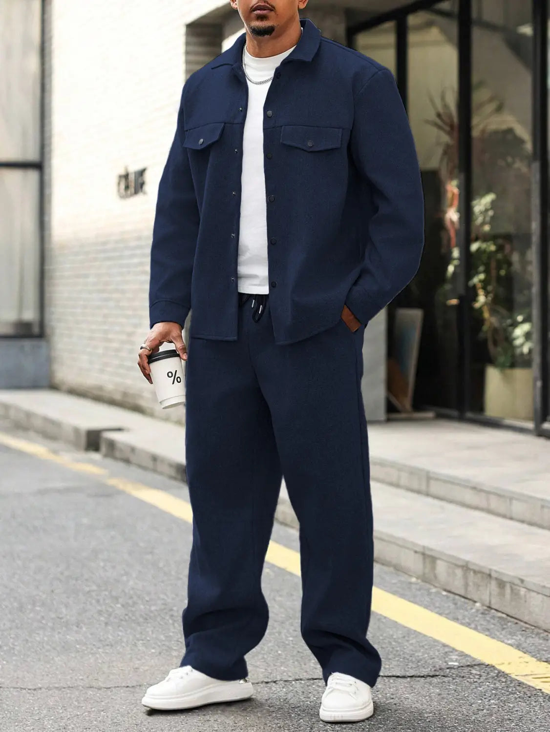 Navy blue mens cargo jacket and pants set featuring a button-up shirt with two chest pockets and a collar.