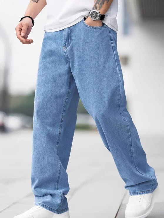 Men’s relaxed straight leg light wash denim jeans featuring a relaxed wide-leg cut in light-wash blue denim.