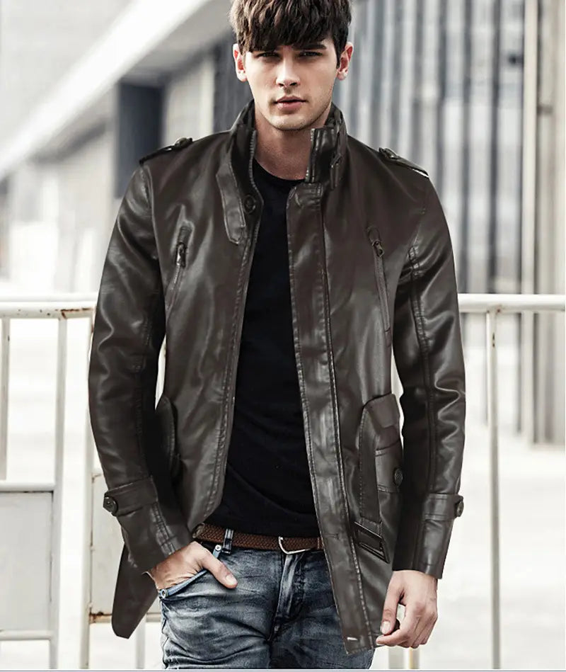 Men’s mid-length fleece lined dark brown faux leather bomber jacket with high collar and flap pockets.
