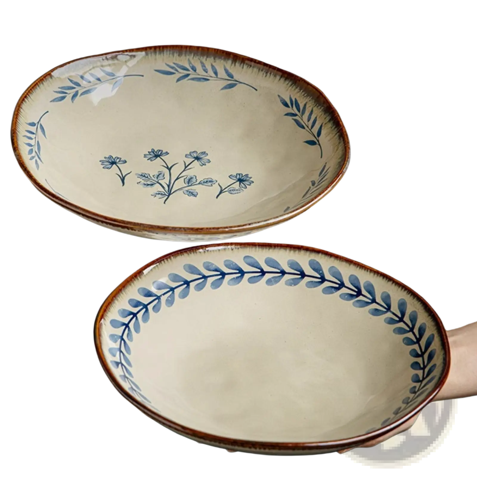 Two 9-inch ceramic deep plates with cream glaze, blue leaf pattern, and rustic brown rims