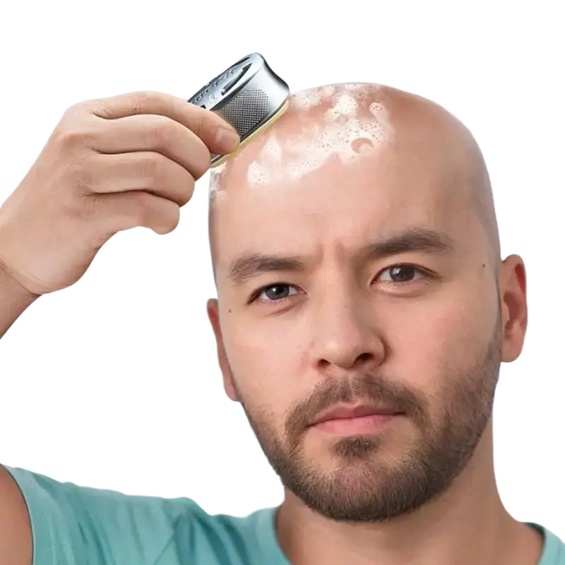 Silver metallic 9-layer razor replacement blade head with textured surface and rounded edge applying foamy product to scalp