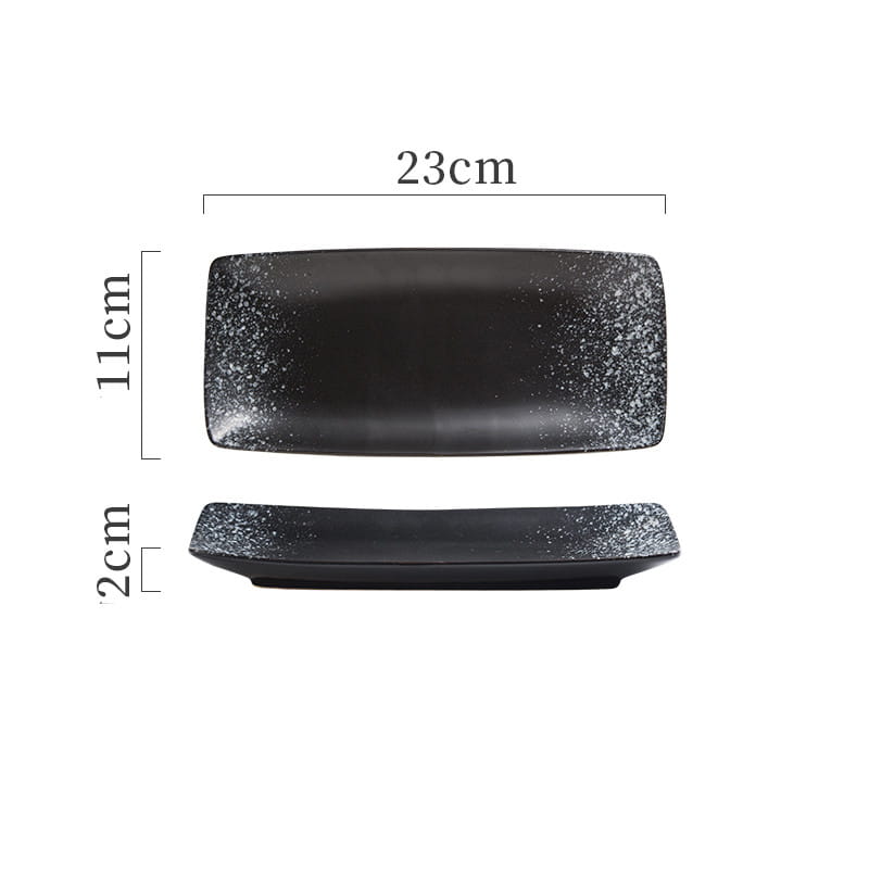 Black rectangular ceramic sushi plate with a speckled silver glaze finish ideal for serving Japanese cuisine.