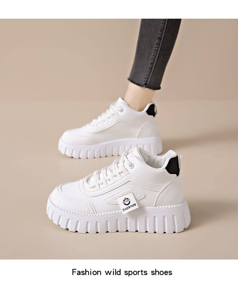 Cream-colored women’s chunky platform breathable high top sneakers with ridged sole and beige suede accents.