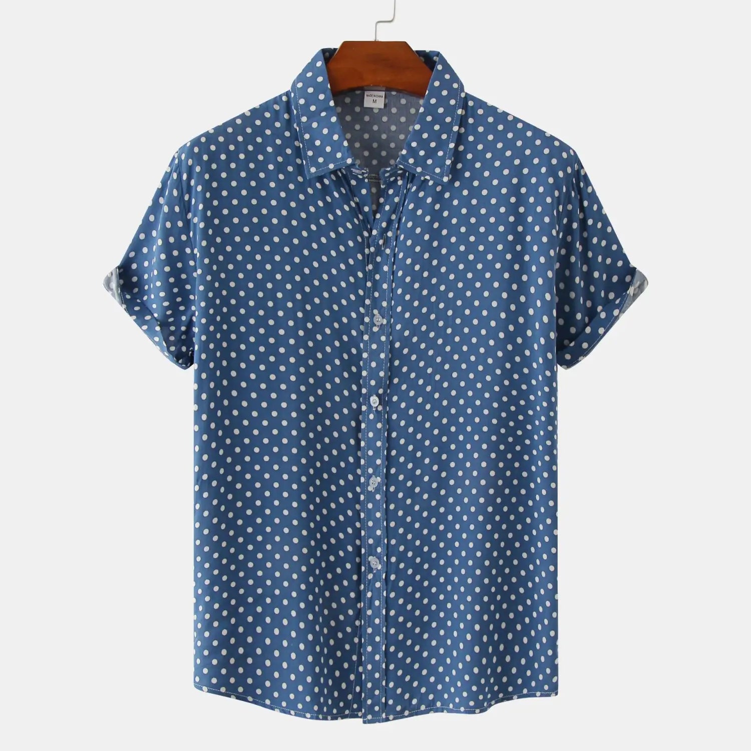 men plus size blue short-sleeved button-up shirt with white polka dots featuring a collar and rolled cuffs