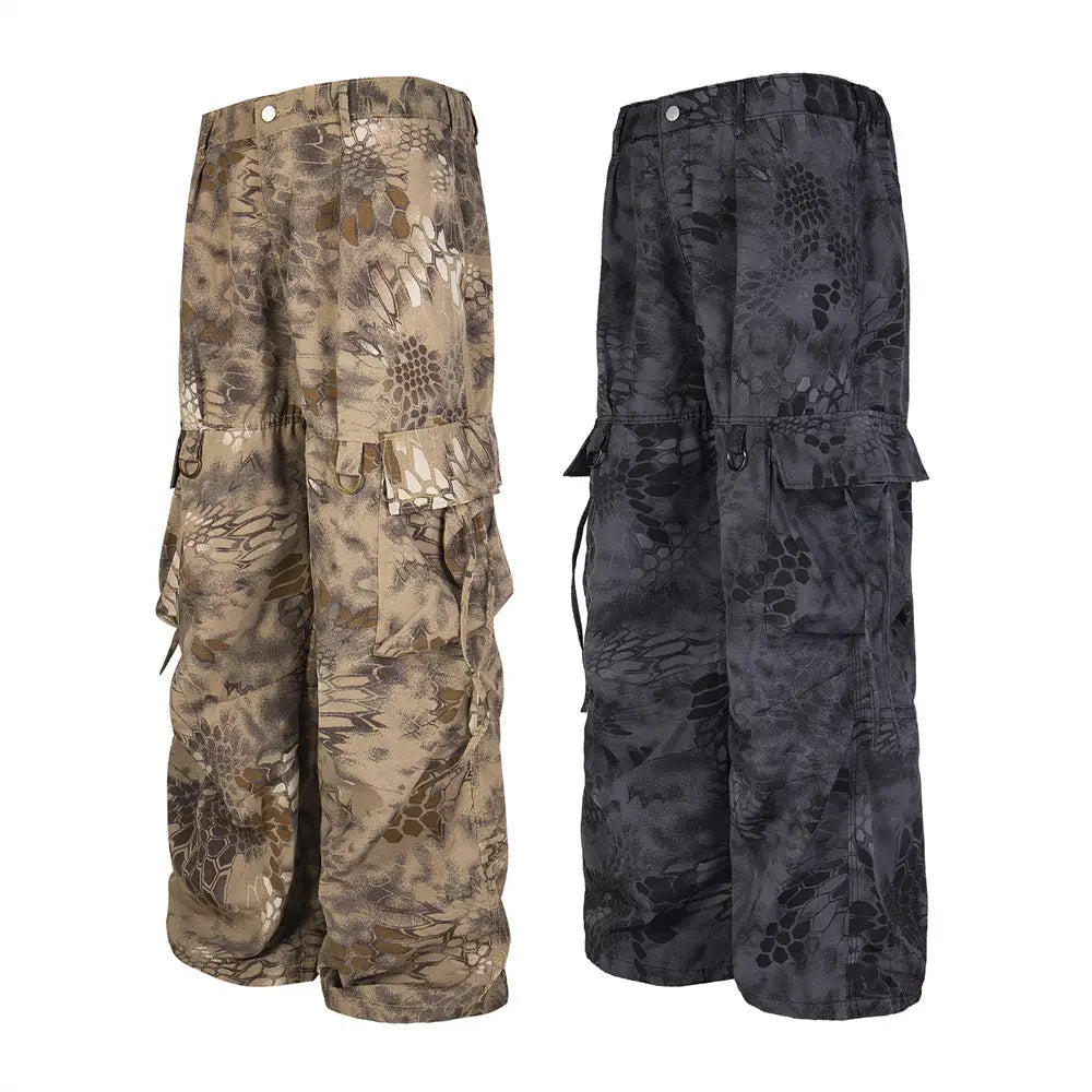 Tactical cargo pants in tan and black camouflage patterns featuring multiple pockets designed as wide leg tactical trousers.