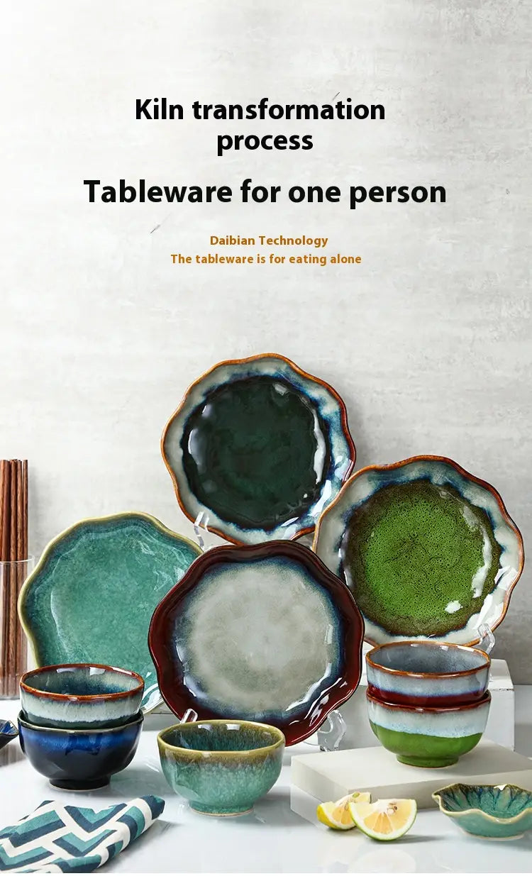 Handcrafted ceramic tableware set scalloped fambe diamond dishes featuring vibrant gradient glazes in teal green and earthy tones with a rustic hand-thrown design.