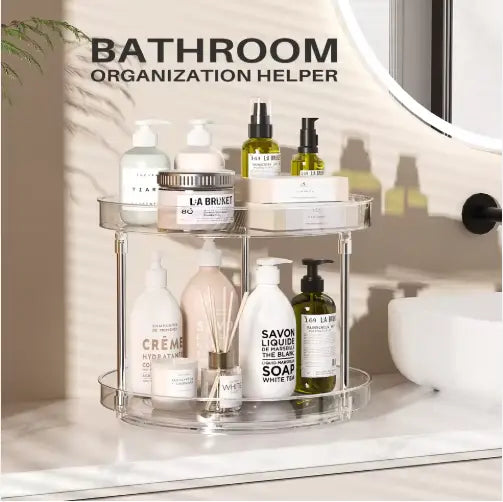 Clear acrylic two-tier bathroom organizer with rounded edges and transparent shelves featured in a 2-tier rotating spice rack clear acrylic turntable pack of 2.