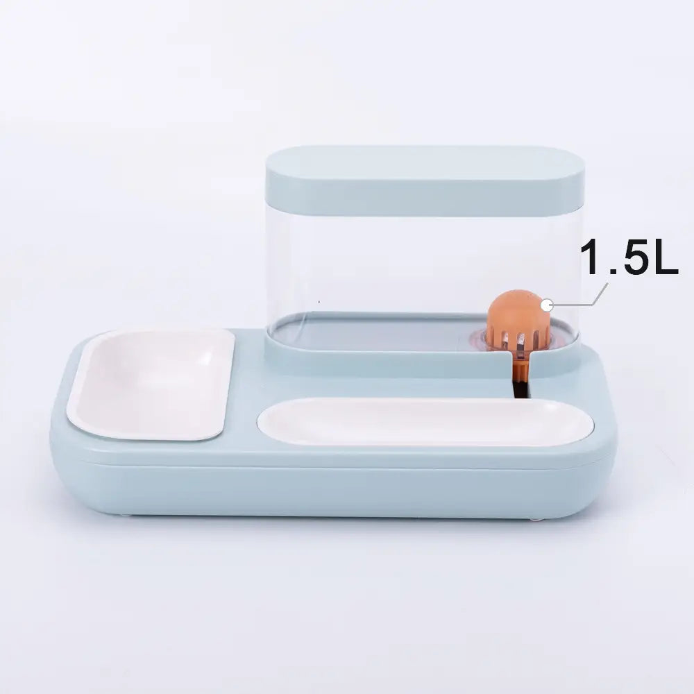 Light blue plastic automatic pet feeder and water dispenser with a transparent 1.5l food container and two white bowls one square and one oval-shaped.