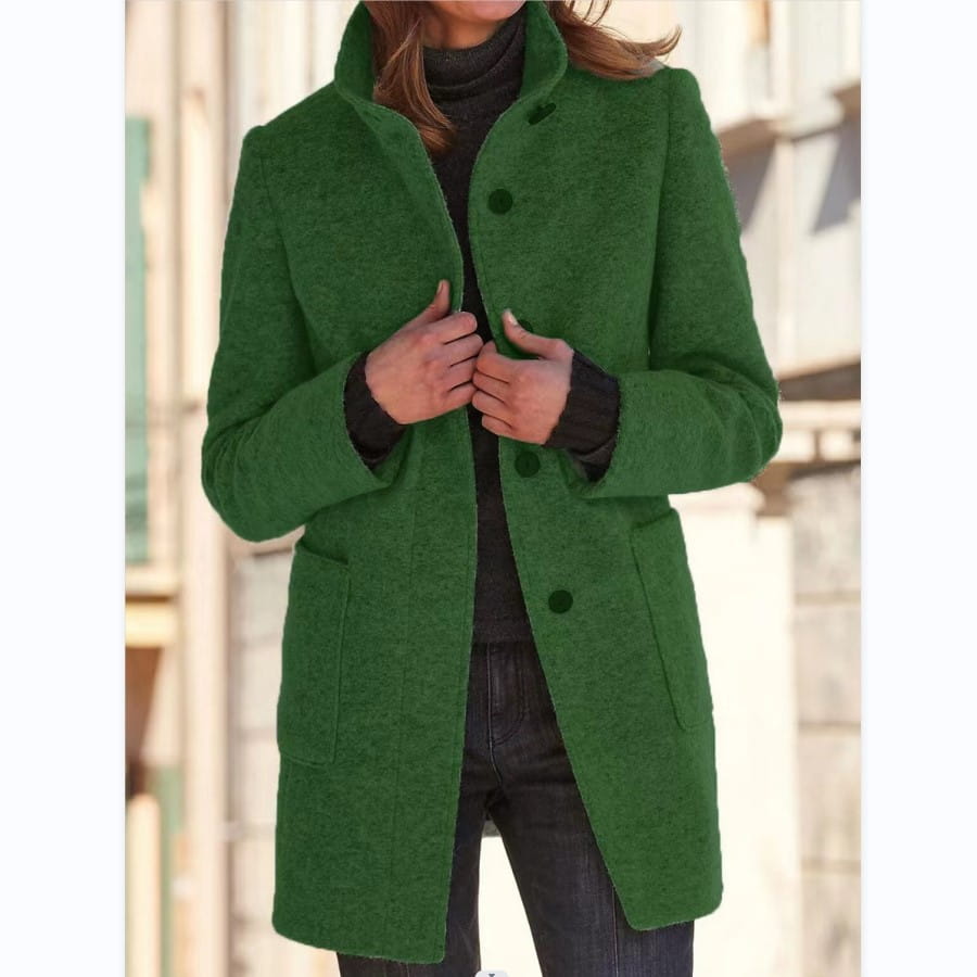 Emerald green textured woolen stand collar winter coat for women with a classic collar and dark buttons.