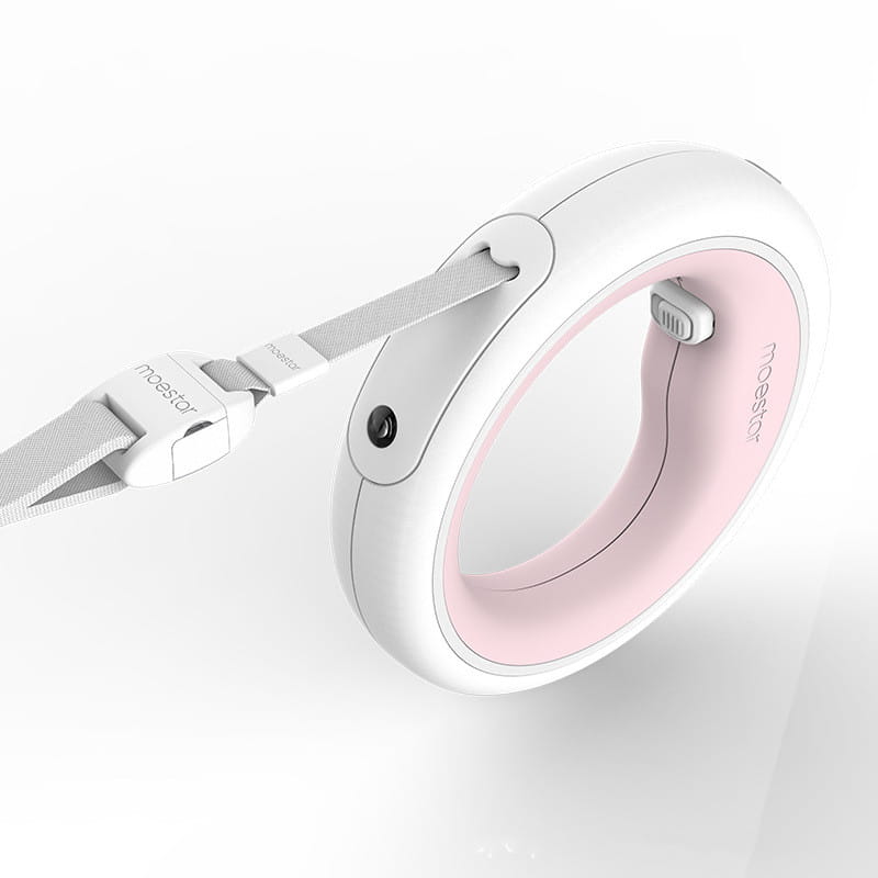 White and pink moestar baby walker with a sleek circular design shown alongside a retractable hands free dog leash with led light.