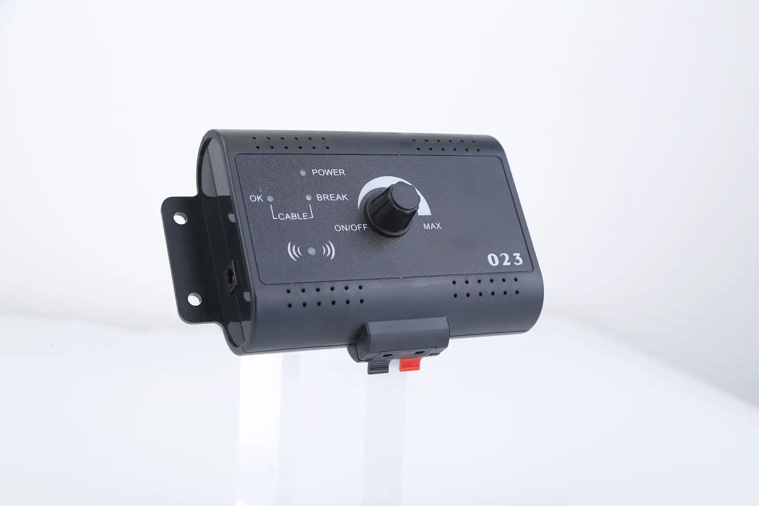 Black plastic electric dog fence system pet deterrent device with rotary dial, power and cable break indicators, and number 023 printed on its surface.