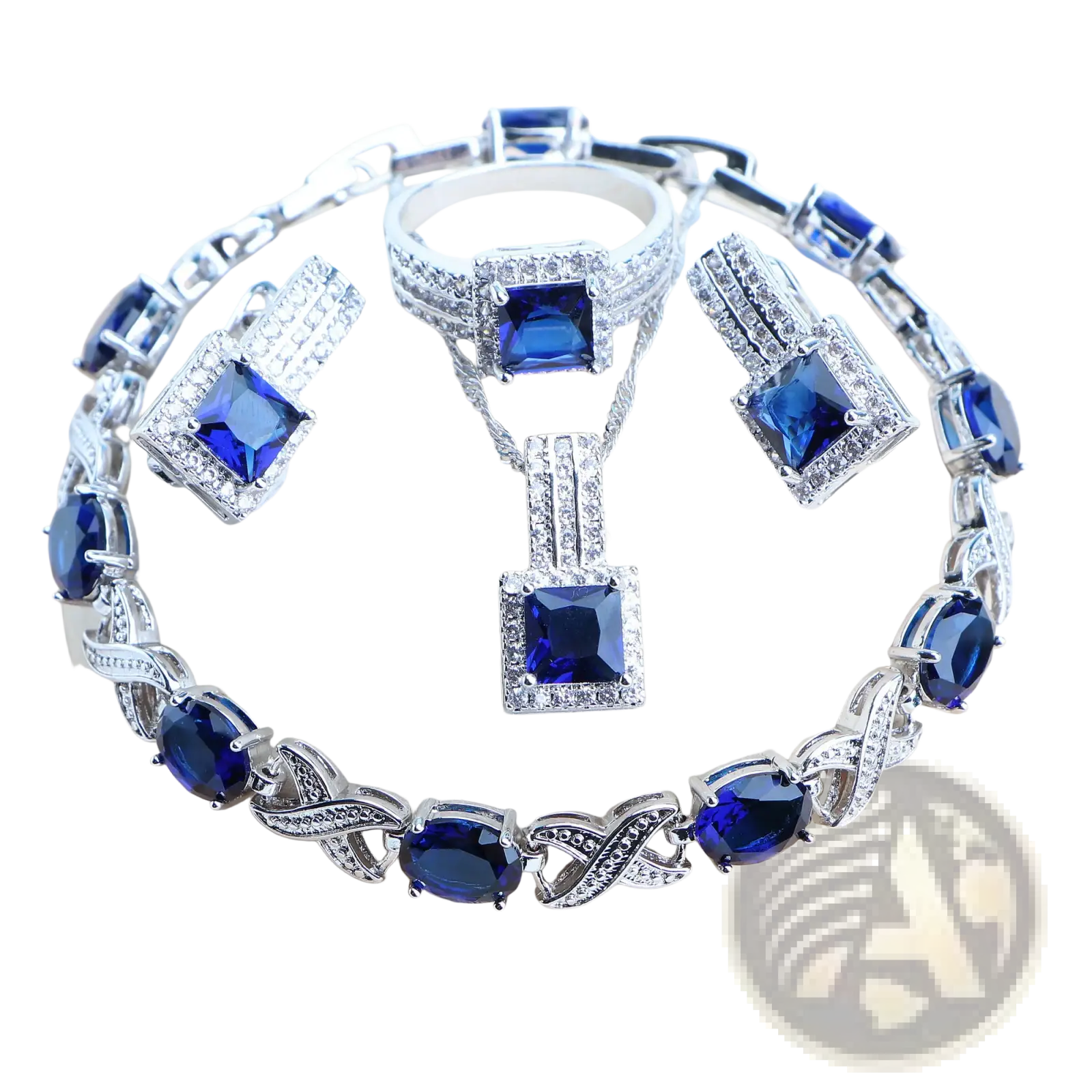 A 925 silver bridal crystal jewelry set with sparkling silver tones and deep blue square and oval-cut stones