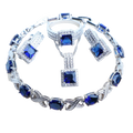 A 925 silver bridal crystal jewelry set with sparkling silver tones and deep blue square and oval-cut stones