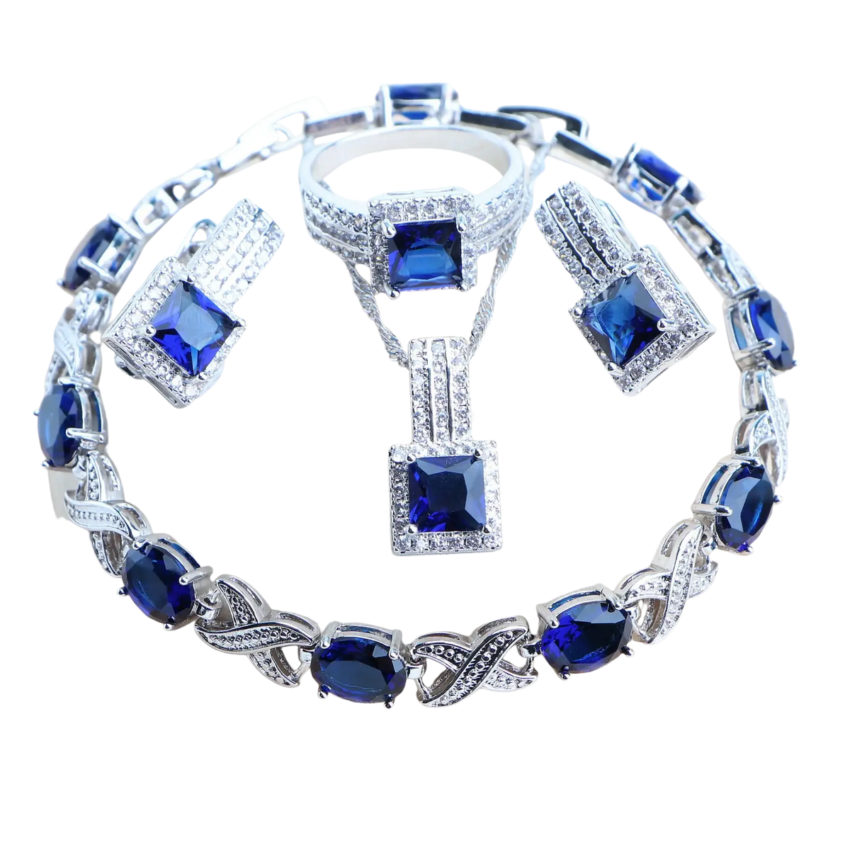 A 925 silver bridal crystal jewelry set with sparkling silver tones and deep blue square and oval-cut stones