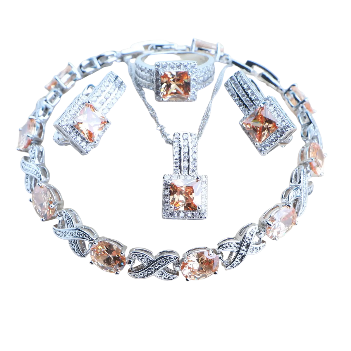 Silver-toned 925 silver bridal crystal jewelry set with matching bracelet necklace ring and earrings featuring amber stones and clear crystals