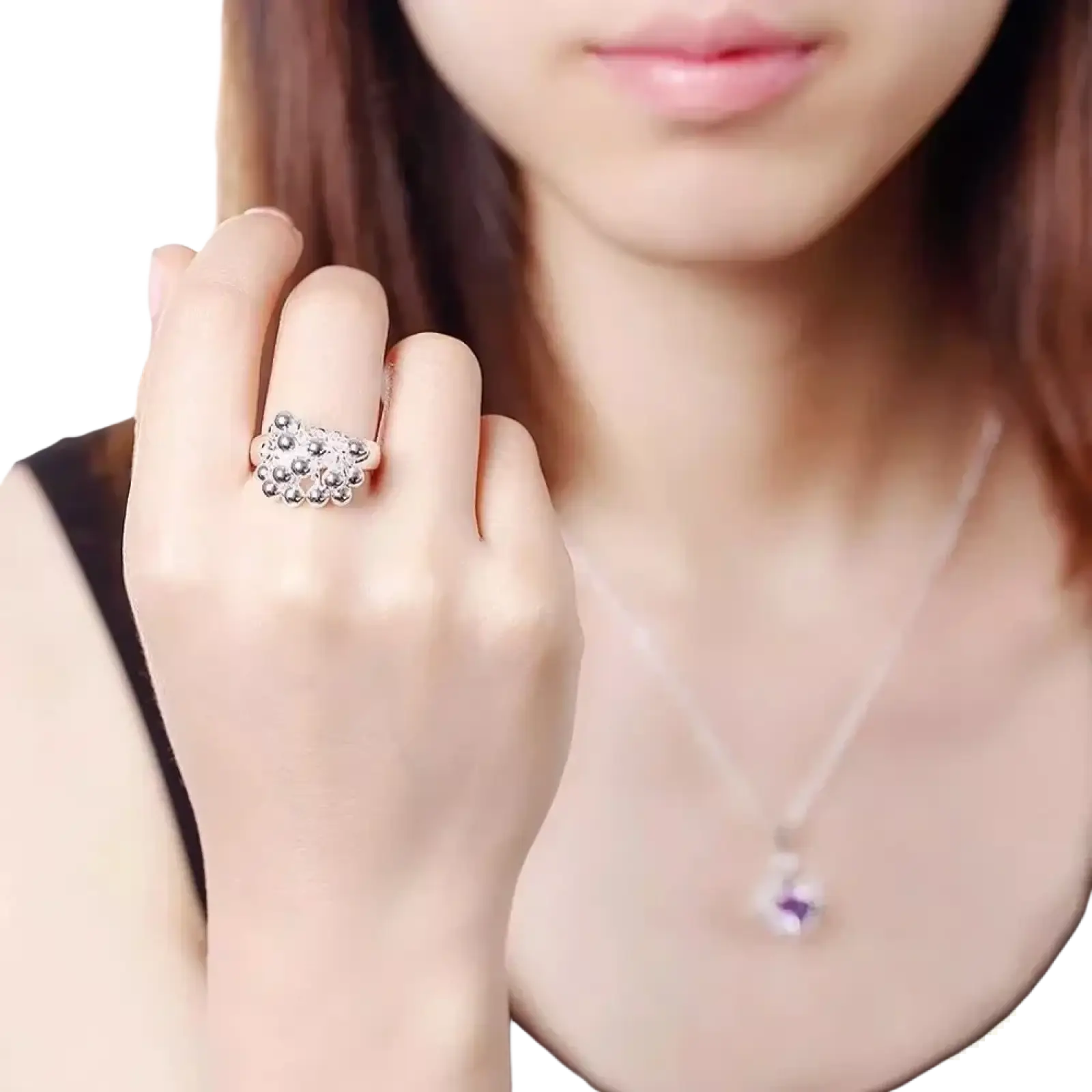 A 925 silver grape bead ring featuring a sparkling cluster of clear round stones in an intricate floral design