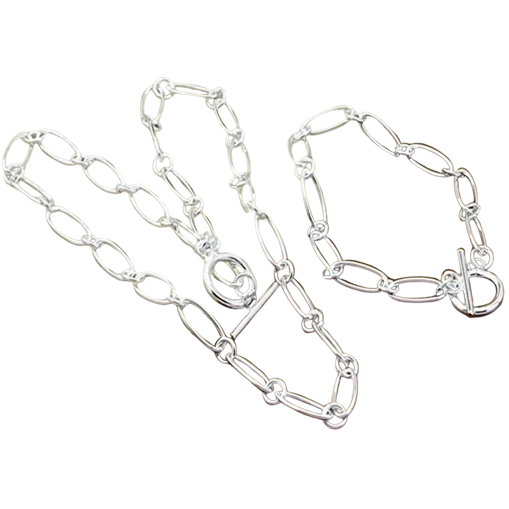 925 silver oval link jewelry set featuring a silver oval link chain necklace and bracelet by Aravant