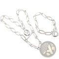 925 silver oval link jewelry set featuring a silver oval link chain necklace and bracelet by Aravant