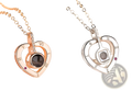 925 sterling silver i love you heart pendant necklace with rose gold and silver tone, roman numerals, diamonds, and red gemstones