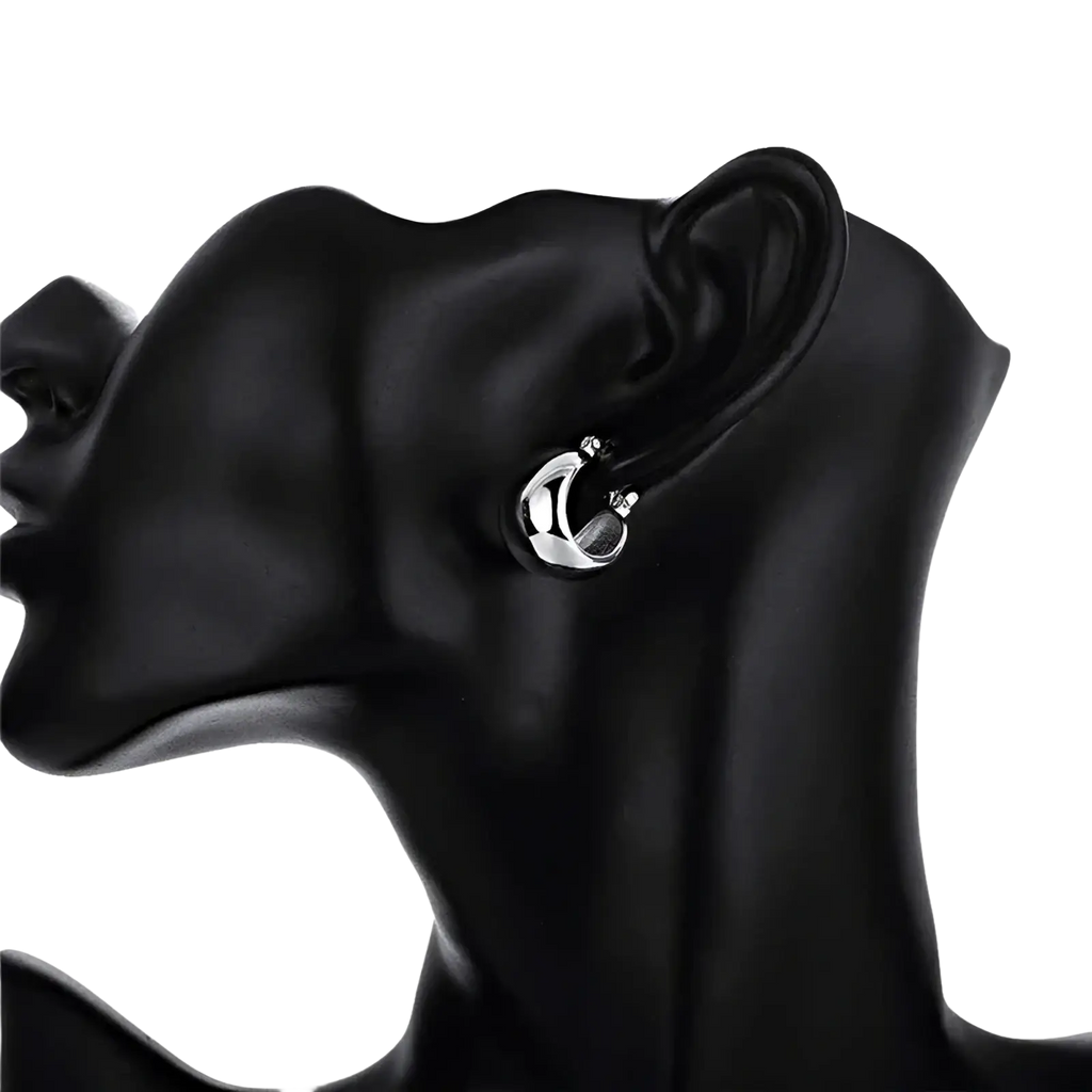 925 sterling silver minimalist hoop earrings in silver tone with sleek modern design and subtle texture