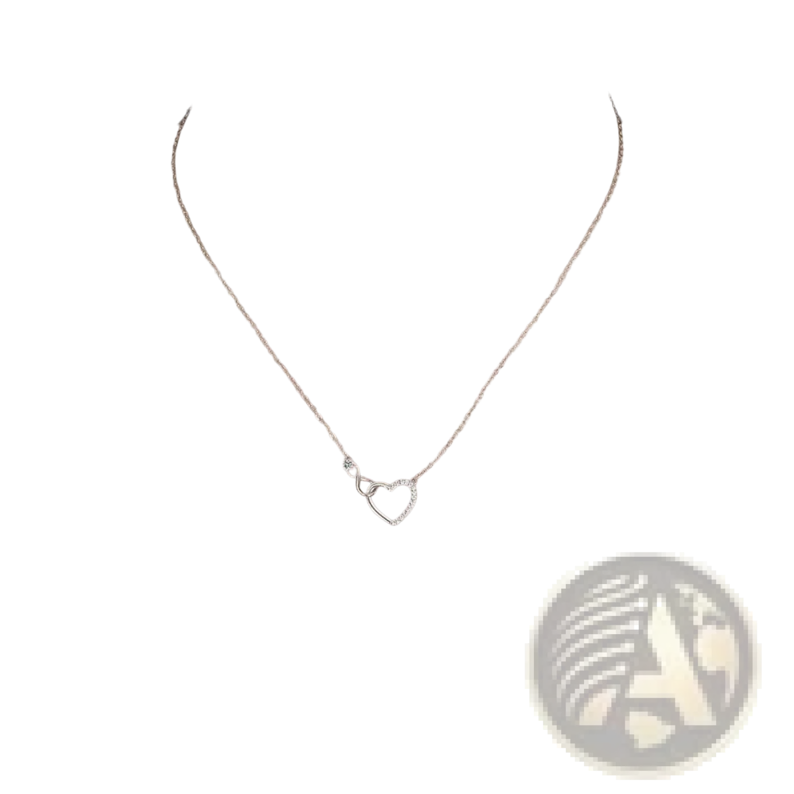 A delicate 925 sterling silver chain necklace with an open pave crystal infinity heart pendant
