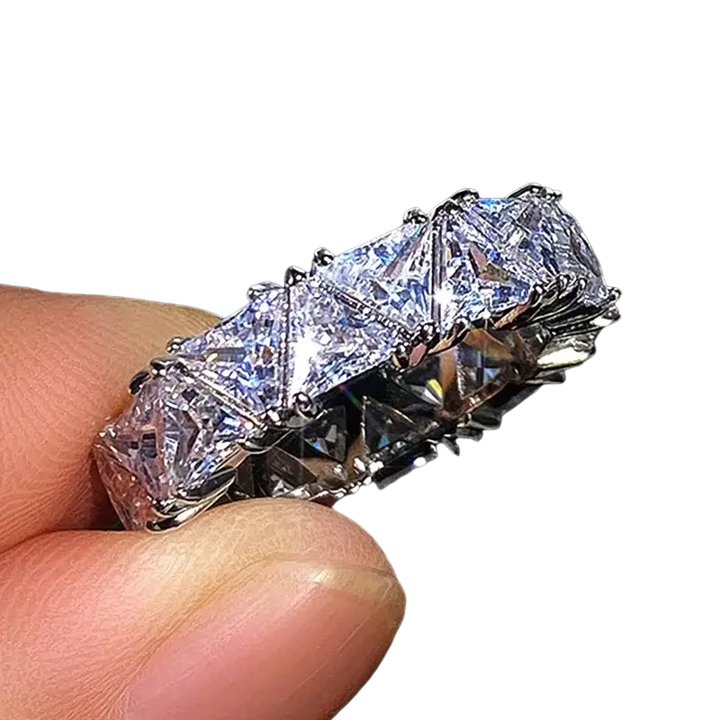 925 sterling silver zircon eternity ring with large rectangular-cut clear gemstones in an intricate silver band design