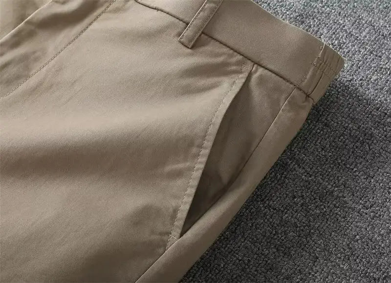 men casual slim fit cargo shorts in beige chino fabric with a clean tailored fit and subtle stitching details